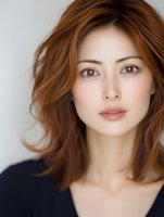 Professional portrait of confident Asian woman with shoulder-length brown hair and natural makeup looking directly at camera against neutral background.