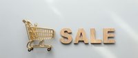 Golden miniature shopping cart beside wooden SALE letters on light gray background with soft shadows, perfect for retail and discount promotions.