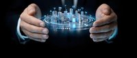 Hands holding glowing holographic cityscape with digital buildings and network connections, representing smart city technology, urban development, and future innovation.