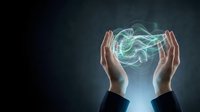Human hands protecting glowing green energy sphere with electric lightning effects on dark background for technology and power concepts.