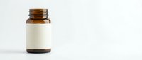 Brown glass medicine bottle with blank white label isolated on white background for pharmaceutical packaging and branding mockup designs.