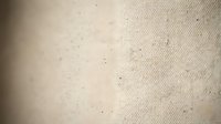 Natural beige canvas texture with organic cotton fibers and subtle weave pattern for backgrounds and design projects.