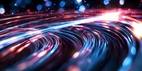 Dynamic swirling light trails in vibrant blue and red colors creating futuristic energy waves with bokeh effects for technology and motion graphics.