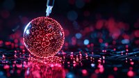 Glowing red Christmas ball ornament with sparkling bokeh reflections on dark surface, festive holiday decoration in dramatic lighting.