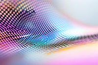 Vibrant holographic wave pattern with pink, purple, and turquoise colors creating dynamic optical effect on blurred background, modern abstract design for creative projects.