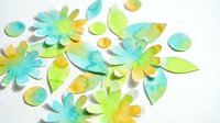 Watercolor flowers and leaves in turquoise, yellow, and lime green isolated on white background, ready for design projects, crafts, and decorative applications.
