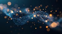 Magical glowing particles flow in dark blue space with golden bokeh lights creating ethereal atmosphere. Abstract background for creative projects.
