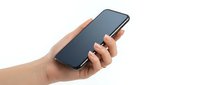 Hand holding modern smartphone with blank black screen isolated on white background for mobile app mockup and digital technology presentation.