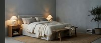 Serene bedroom interior with neutral tones, wooden bed frame, layered bedding, warm table lamps, and minimalist decor for home design and lifestyle projects.