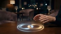 Businessman hands protecting glowing circular holographic interface with light effects in modern office environment for technology and innovation concepts.