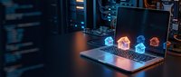 Laptop displaying glowing holographic house icons in server room environment with data center equipment and network infrastructure for smart home technology and digital real estate concepts.