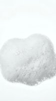 Abstract gray watercolor splash with organic texture on white background for creative design projects and artistic compositions.
