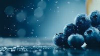Fresh ripe blueberries with water drops on dark background with bokeh lights and copy space, macro food photography for healthy eating concept.