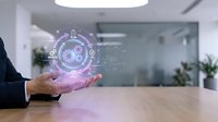 Businesswoman holding glowing zodiac wheel with astrology symbols and pink light particles in modern office workspace for horoscope and fortune telling concepts.