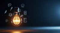 Glowing light bulb with innovation icons floating around on dark blue background representing creative ideas and business solutions.