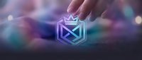 Young adult hand touching glowing neon crown shield logo with geometric design, representing digital innovation, technology leadership, and premium brand identity for corporate marketing.