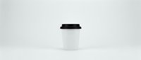 White disposable coffee cup with black lid on clean background for branding mockup and cafe marketing materials.