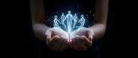 Glowing holographic human figures floating above cupped hands representing teamwork, leadership, and digital transformation in business technology.