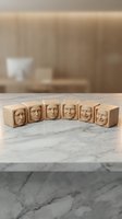 Wooden blocks with carved human faces showing different emotions from sad to happy arranged on marble surface representing mood progression and emotional wellness.