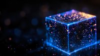 Glowing digital cube made of blue and gold particles with luminous edges floating in dark space, representing technology, data, and innovation for digital design projects.