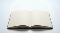 Open blank notebook with empty pages ready for writing, journaling or sketching on clean white background for educational and office design projects.