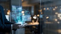 Businessman holding holographic digital network icons in modern office environment showcasing connectivity and technology innovation concepts.