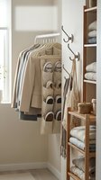 Organized walk-in closet with hanging clothes, shoe organizer, wooden shelving unit and wicker baskets for home storage and organization solutions.