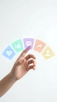 Hand reaching toward colorful social media icons including heart, thumbs up, chat bubble, share and user profile symbols for digital marketing campaigns.