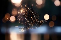 Magical glowing dove silhouette with sparkles and bokeh lights against dark background creates ethereal atmosphere for spiritual and peaceful designs.