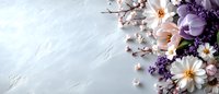 Spring floral arrangement with purple and white flowers on textured white background. Delicate blooms create elegant botanical composition for greeting cards.