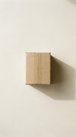 Closed cardboard shipping box with kraft paper exterior and metal staples on neutral beige background, casting shadow. Isolated packaging for delivery, logistics, e-commerce, and shipping design projects.