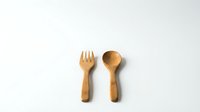 Wooden fork and spoon set isolated on white background for kitchen utensils and eco-friendly dining concepts.