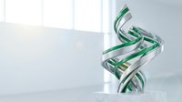 Green and silver metallic ribbons twisted in elegant spiral formation against clean white background for luxury gift wrapping and festive decoration projects.