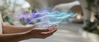 Hands holding glowing digital sound waves with purple and teal energy streams floating above palms in modern tech concept for audio innovation and futuristic design.