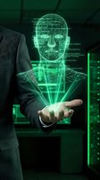Businessman holding holographic human head projection with wireframe design in green data center environment for artificial intelligence concepts.
