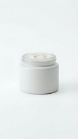 Open white cosmetic jar with cream on neutral background for skincare and beauty product packaging design.