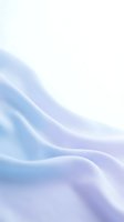 Soft flowing silk fabric with gentle curves in pastel blue and purple gradient colors creating elegant waves and smooth texture for luxury design projects.