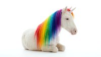 White unicorn plush toy with vibrant rainbow mane and horn, sitting isolated on white background, ready for design use.