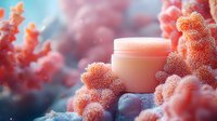 Luxurious coral-colored cosmetic cream jar surrounded by delicate coral reef textures and bubbles in dreamy pink and blue underwater atmosphere.