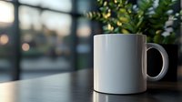 White ceramic coffee mug on dark wooden table near window with blurred bokeh background and green plant, morning atmosphere for cafe or home office setting.