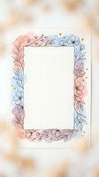 Watercolor floral frame with delicate flowers and leaves in pastel colors, empty space for text or photos, wedding invitation border design.