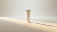 Minimalist white cosmetic tube on a beige background with soft warm light and shadow, mockup for skincare or beauty product branding.