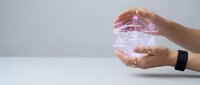 Female hands protecting holographic shield with security lock icon representing cybersecurity data protection and digital safety technology concept.