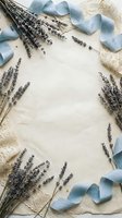 Dried lavender sprigs and blue ribbon create elegant frame border on vintage paper background for wedding invitations and romantic stationery designs.