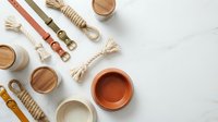 Handcrafted ceramic bowls and rope accessories arranged on white marble surface for modern kitchen and dining room decor styling.