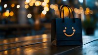 Black shopping bag with smiling face on wooden table against blurred warm bokeh lights creating cozy evening atmosphere, concept of happy shopping and customer satisfaction.