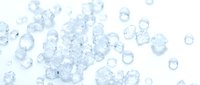 Clear ice cubes and crushed ice scattered on white background, suitable for beverage, food and drink, refreshment and cooling product advertising.