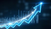 Glowing blue upward arrow with financial charts and data visualization on dark background representing business growth and market success.