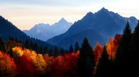 Dramatic mountain landscape with vibrant autumn foliage in foreground featuring red and golden trees against dark evergreen forest and majestic peaks during sunset.