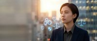 Professional Asian businesswoman contemplating digital justice symbols and legal technology icons in modern urban office environment at sunset.